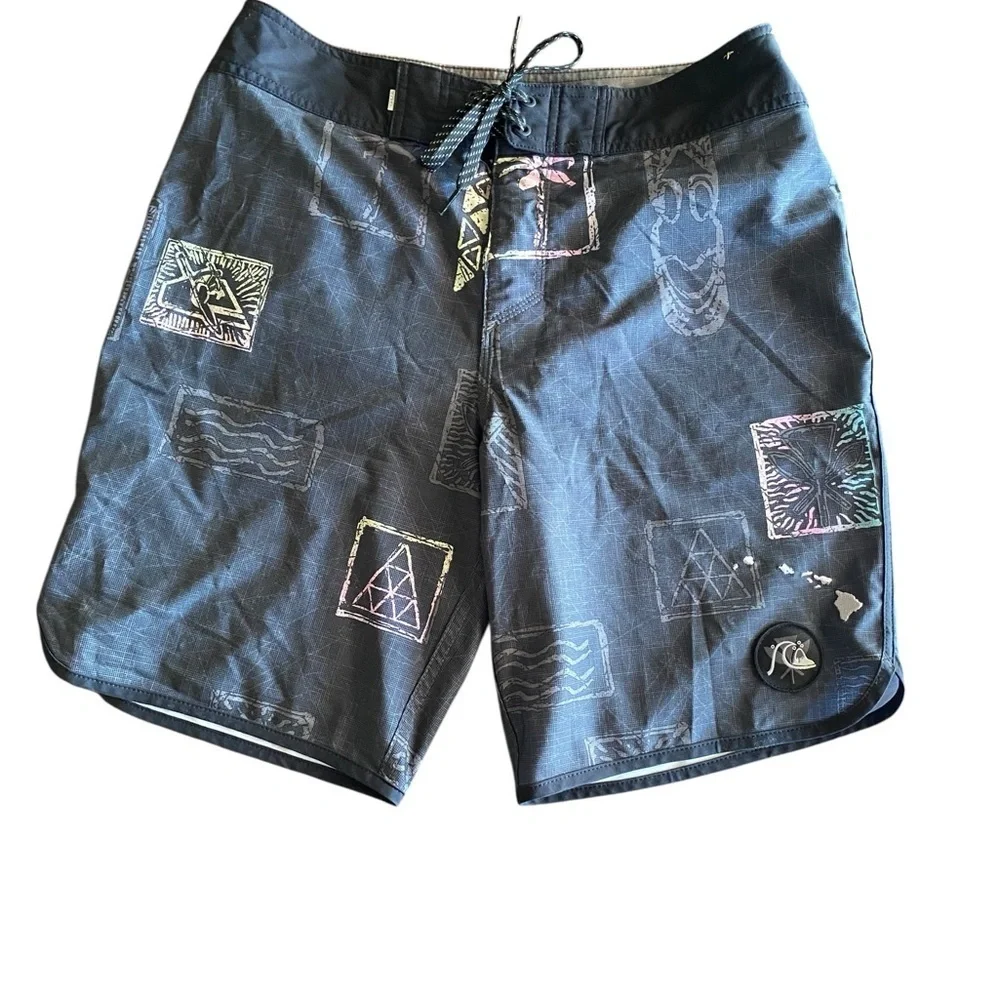 Quicksilver sustainable designed n Hawaii gray pink tiki hawaiin done